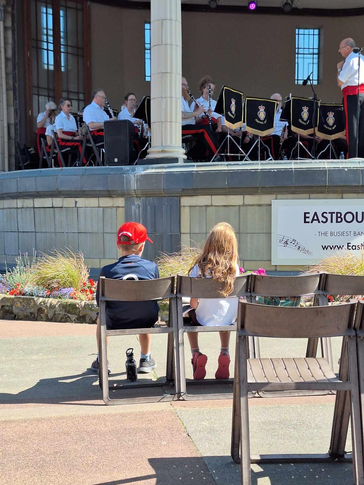 Young children in the audience chairs