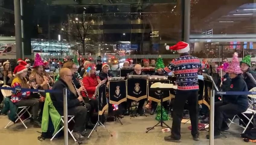 The band performing in St Pancras Station